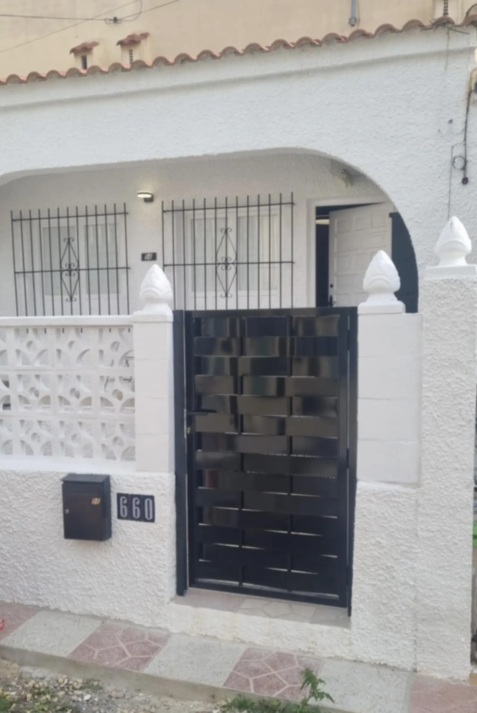 Bungalow front gate and entrance